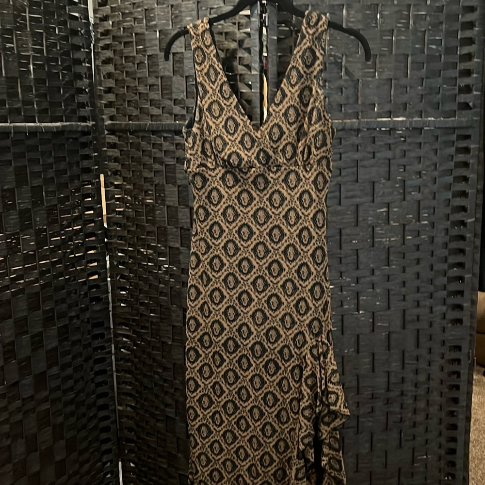 Brown and black vneck dress with side opening.